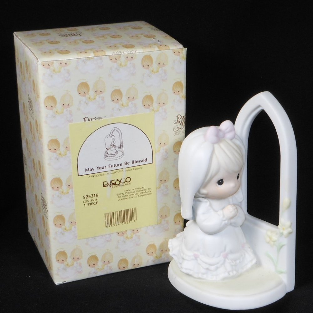 New Precious Moment Figurine.